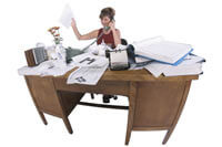 Secretary with busy desk